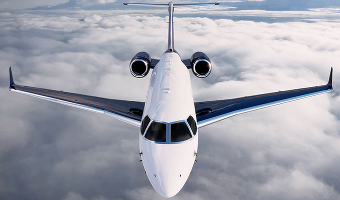 Embraer Legacy 450 midsize jet view 1 for Dallas charter
